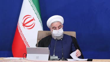 A handout picture provided by the Iranian presidency on April 7, 2021 shows President Hassan Rouhani attending a cabinet meeting in the capital Tehran. (Iranian Presidency/AFP)