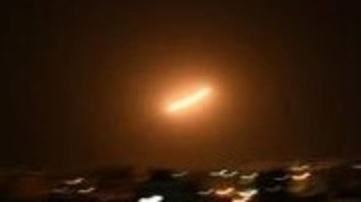 Israel’s military says its artillery striking Syria after rocket attack