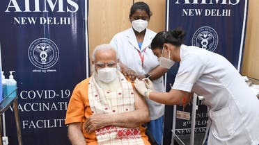 India’s Prime Minister Narendra Modi receives his second dose of a coronavirus vaccine at the All India Institute of Medical Sciences (AIIMS) hospital in New Delhi, India, April 8, 2021. (Reuters)