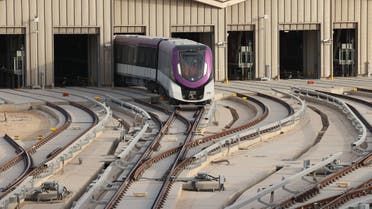 A metro line leaves on a test drive to the King Abdullah Financial District station during an exclusive tour of the Riyadh Metro on April 1, 2021 in the Saudi capital. (AFP)