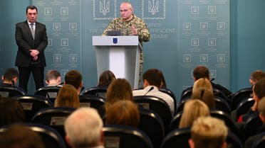Ruslan Khomchak, military commander of the Armed Forces of Ukraine, speaks flanked by Oleksiy Danilov, secretary of Ukraine's Security Council, at a briefing following an outbreak of violence with pro-Russian separatists on the frontline, in Kiev, on February 18, 2020. (AFP)