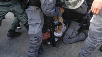 Israeli lawmaker beaten by police for protesting against Jewish settlements
