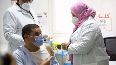 Libyan PM Dbeibah receives the coronavirus vaccination at a Centre for Disease Control in the capital Tripoli on April 10, 2021, at the launch of the national vaccination campaign. (Mahmud Turkia/AFP)