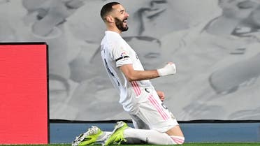 Real Madrid's French forward Karim Benzema celebrates after scoring during the El Clasico Spanish League football match between Real Madrid CF and FC Barcelona at the Alfredo di Stefano stadium in Valdebebas, on the outskirts of Madrid on April 10, 2021. (AFP)