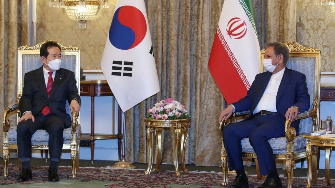 A handout picture provided by the official website of Iran's Vice President on April 11, 2021 shows Vice-President Eshaq Jahangiri (R) meeting with South Korea's Prime Minister Chung Sye-kyun in Tehran. (AFP)