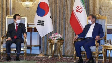 A handout picture provided by the official website of Iran's Vice President on April 11, 2021 shows Vice-President Eshaq Jahangiri (R) meeting with South Korea's Prime Minister Chung Sye-kyun in Tehran. (AFP)