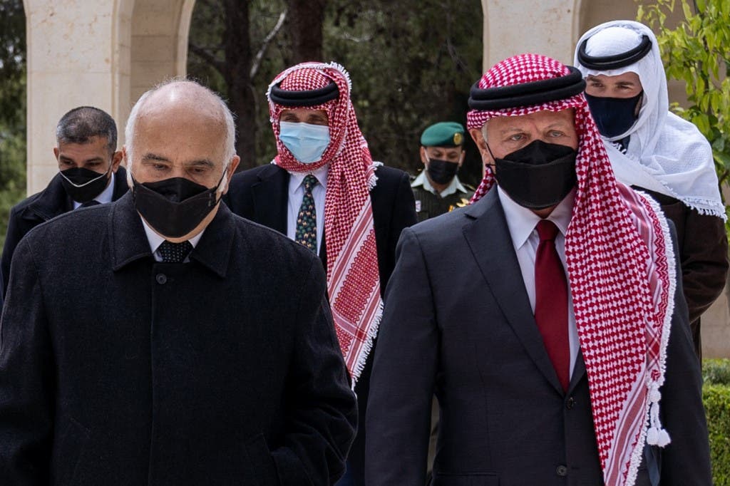 A handout picture released by the Jordanian Royal Palace on April 11, 2021 shows Jordanian King Abdullah II (R), Prince Hassan Bin Talal (L) and Prince Hamzah (C) arriving at the Raghadan Palace in the capital Jordan. (AFP)