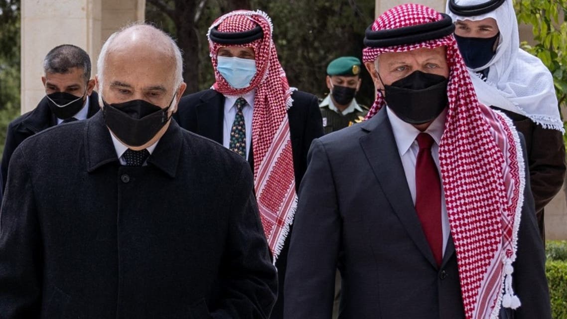 A handout picture released by the Jordanian Royal Palace on April 11, 2021 shows Jordanian King Abdullah II (R), Prince Hassan Bin Talal (L) and Prince Hamzah (C) arriving at the Raghadan Palace in the capital Jordan. (AFP)