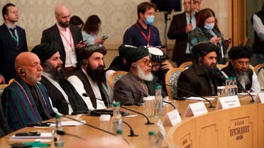 Officials, including Afghan former President Hamid Karzai and the Taliban's deputy leader and negotiator Mullah Abdul Ghani Baradar, attend the Afghan peace conference in Moscow, March 18, 2021. (Reuters)