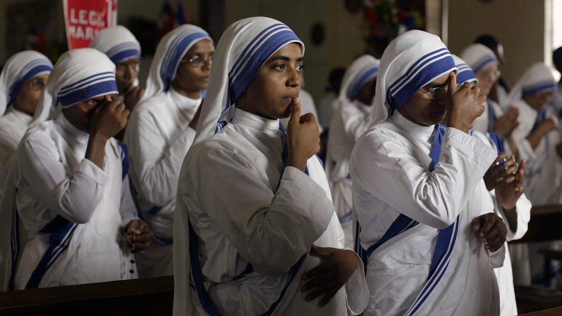 Nuns pray during Mass in downtown Port-au-Prince June 27, 2007. Roman Catholicism is the official religion of Haiti. (Reuters)