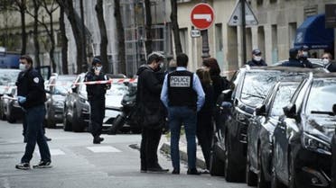 French police police officers stand near the Henry Dunant private hospital where one person was shot dead and one injured in a shooting outside the instituion owned by the Red Cross in Paris' upmarket 16th district on April 12, 2021. (AFP)