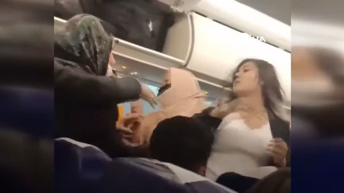 Women passengers on a Tunisian plane hit each other