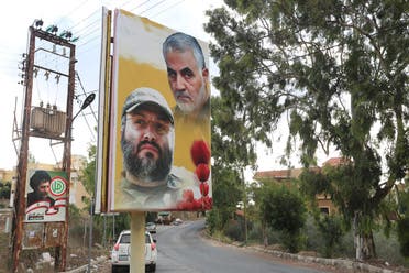 A poster depicting assassinated Hezbollah military commander Imad Mughniyeh and Iran's Quds Force top commander Qassem Soleimani in Ain Qana, Lebanon, Sept. 22, 2020. (Reuters)