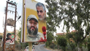 A poster depicting assassinated Hezbollah military commander Imad Mughniyeh and the late Iran's Quds Force top commander Qassem Soleimani in Ain Qana, Lebanon, Sept. 22, 2020. (Reuters)