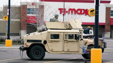 A National Guard soldier maintains watch at a shopping center in Brooklyn Center, Minneapolis, April 12, 2021. (Reuters)