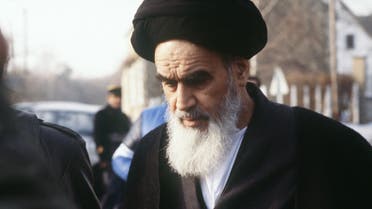 Ruhollah Khomeini comes out of his villa to go for the Friday prayer in January 1979 at Neauphle Le Chateau in France.