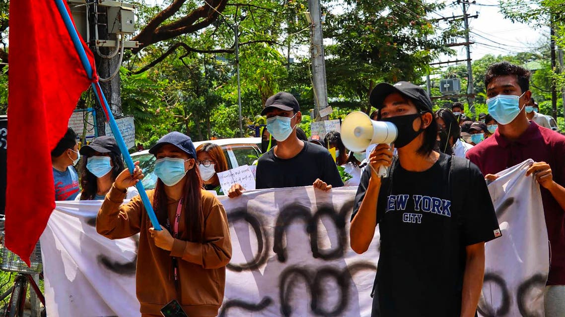 This photo taken and received courtesy of an anonymous source via Facebook on April 13, 2021 shows protesters taking part in a demonstration against the military coup in Yangon's Thuwana township.