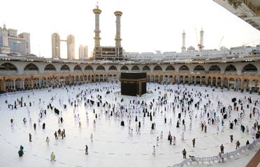 Muslim worshippers gather for prayers around the Kaaba, the holiest shrine in the Grand mosque complex in the Saudi city of Mecca during the first day of the Muslim holy fasting month of Ramadan on April 13, 2021. (File photo: AFP)