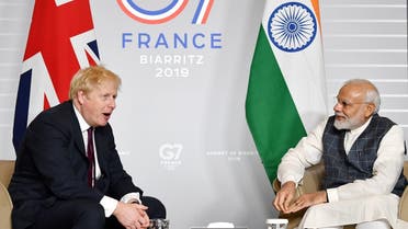 Britain’s Prime Minister Boris Johnson meets Indian Prime Minister Narendra Modi at a bilateral meeting during the G7 summit in Biarritz, France, on August 25, 2019. (Reuters)