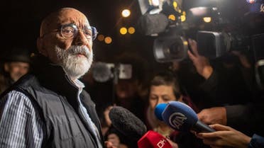 In this file photo taken on November 4, 2019 Turkish journalist and writer Ahmet Altan (L) speaks to journalists after being realised. A top Turkish court ordered, on April 14, 2021, the release of journalist and novelist Ahmet Altan, who was jailed for his alleged involvement in a failed 2016 coup attempt. The Court of Cessations ruling came a day after the European Court of Human Rights demanded the release of Altan, 71, who has spent more than four years behind bars after writing articles critical of Turkish President. (AFP)