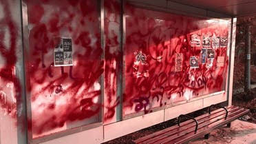 This photo taken and received courtesy of an anonymous source via Facebook on April 14, 2021 shows a bus stop covered in red spray paint as part of a bleeding strike demonstration against the military coup in East Dagon township in Yangon. (AFP)
