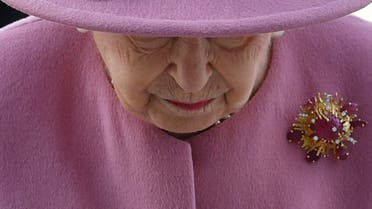 In this file photo taken on October 15, 2020 Britain's Queen Elizabeth II visits the Defence Science and Technology Laboratory (Dstl) at Porton Down science park near Salisbury, southern England. (AFP)
