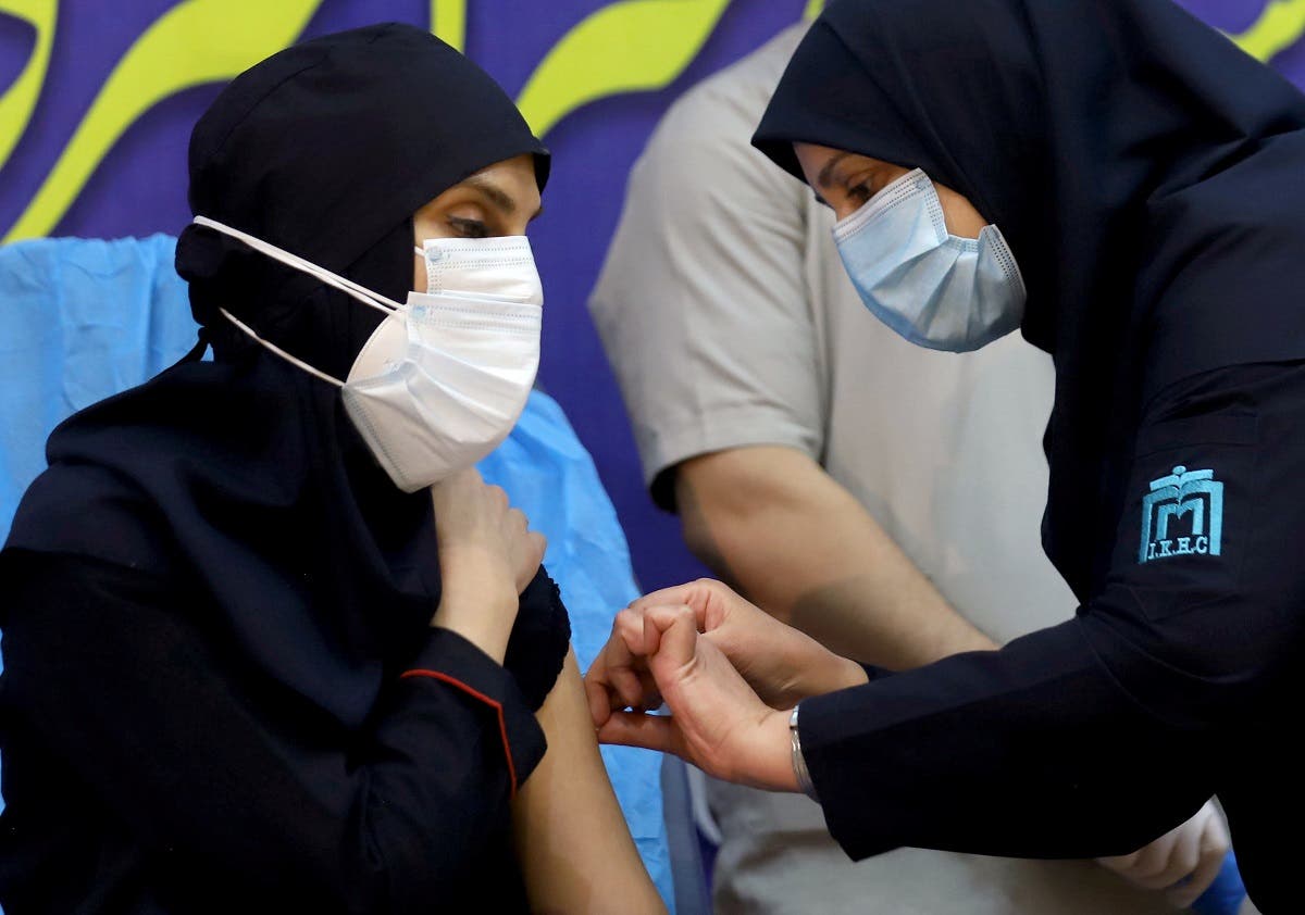 A member of the Imam Khomeini Hospital medical personnel receives a dose of Russia’s Sputnik V vaccine against the coronavirus disease (COVID-19), in Tehran, Iran February 9, 2021. (Reuters)