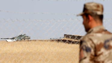 A Turkish armoured vehicle is seen at an observation post in Bashiqa, October 6, 2016. (Reuters)