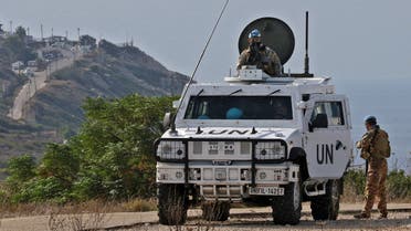United Nations peacekeeping force in Lebanon (UNIFIL) vehicles patrol the Lebanese southern coastal area of Naqura by the border with Israel, on November 11, 2020. (AFP)