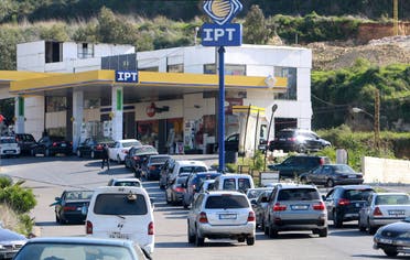Vehicles queue for fuel at a gas station in the village of Msayleh, Lebanon March 16, 2021. (Reuters)