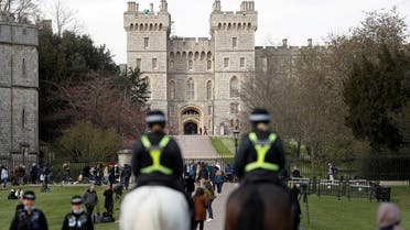 Mounted police officers ride along the Long Walk, near Windsor Castle, after Britain’s Prince Philip, husband of Queen Elizabeth II, died at the age of 99, in Windsor, Britain, on April 16, 2021. (Reuters)