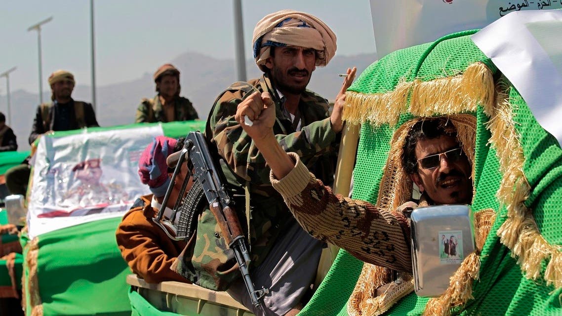 Houthi fighters attend a funeral procession for Houthis who were killed in recent fighting, in Sanaa, Yemen, Feb. 16, 2021. (AP)