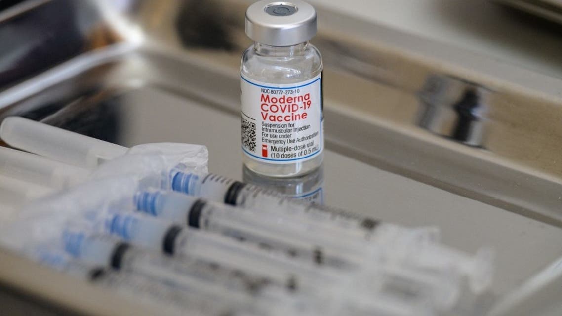 A vial of the Moderna COVID-19 vaccine and syringes sit prepared at a pop up vaccine clinic at the Jewish Community Center on April 16, 2021 in the Staten Island borough of New York City. (AFP)