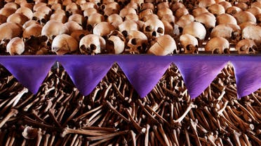 The skulls and bones of Rwandan victims rest on shelves at a genocide memorial inside the church at Ntarama just outside the capital Kigali, August 6, 2010. (Reuters)