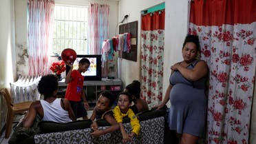 Estela Rosa, 19, who is 8 months pregnant, is pictured at her house where she lives with five other people in the Cidade de Deus slum, during the coronavirus disease (COVID-19) outbreak, in Rio de Janeiro, Brazil March 22, 2020. (Reuters)