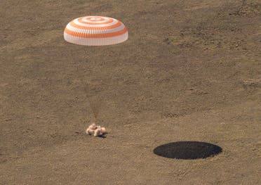 The Soyuz MS-17 space capsule, carrying the International Space Station (ISS) crew members Kathleen Rubins of NASA, Sergey Ryzhikov and Sergey Kud-Sverchkov of Roscosmos, lands in a remote area outside Zhezkazgan, Kazakhstan April 17, 2021. (NASA via Reuters)
