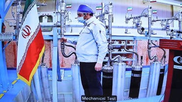 A handout picture provided by the Iranian presidential office on April 10, 2021, shows a grab of a videoconference screen of an enginere inside Iran's Natanz uranium enrichment plant. (AFP)