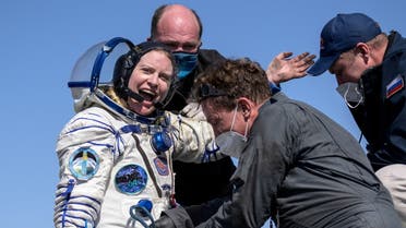 The International Space Station (ISS) crew member Kathleen Rubins of NASA reacts shortly after the landing of the Soyuz MS-17 space capsule in a remote area outside Zhezkazgan, Kazakhstan April 17, 2021. (NASA via Reuters)