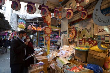 People shop for Ramadan decorations amid the coronavirus disease (COVID-19) pandemic, in Amman, Jordan. (Reuters)