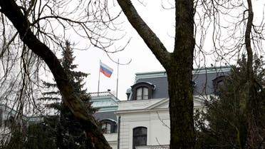 FILE PHOTO: A national flag of Russia flies on the Russian embassy in Prague, Czech Republic, March 26, 2018. REUTERS/David W Cerny/File Photo
