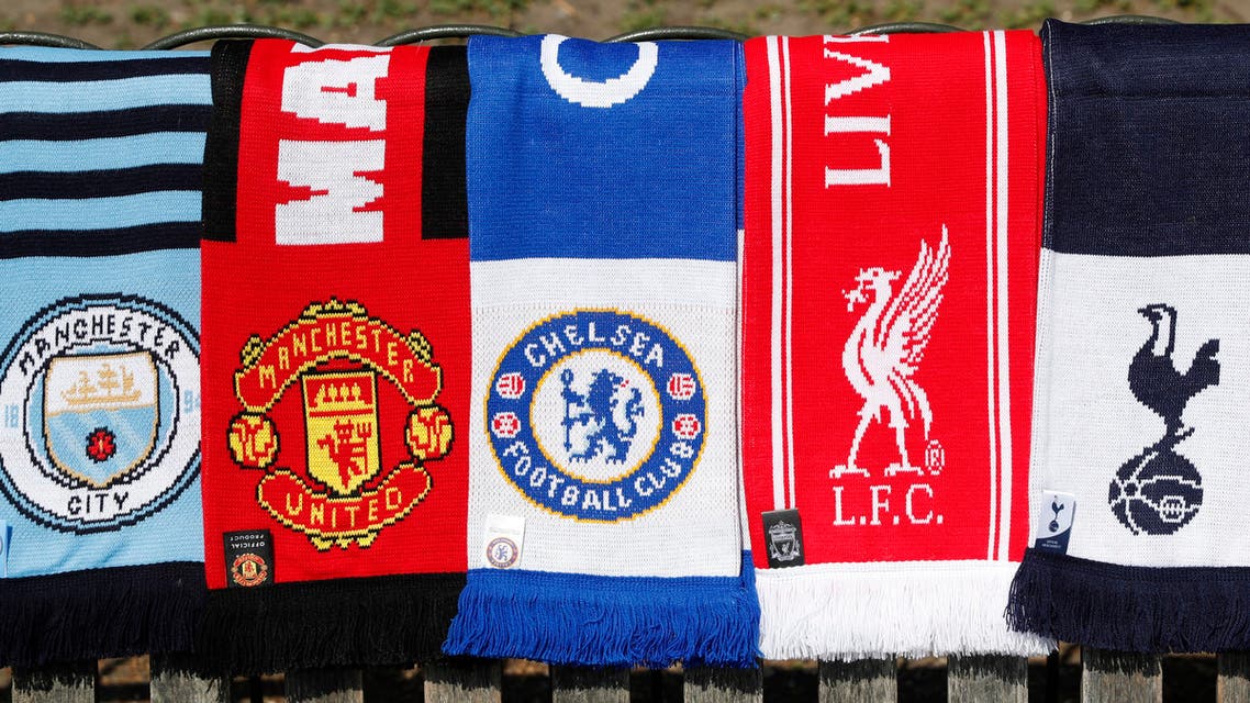  A selection of scarves of the English soccer Premier League teams who are reported to be part of a proposed European Super League, laid out and photographed, in London, Monday, April 19, 2021. The 12 European clubs planning to start a breakaway Super League have told the leaders of FIFA and UEFA that they have begun legal action aimed at fending off threats to block the competition. (AP Photo/Alastair Grant)