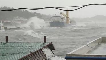 Waves crash the shore as Super Typhoon Surigae moves close to the Philippines in the province of Catbalogan, Samar, Philippines April 18, 2021, in this screen grab obtained from a social media video. (Reuters)