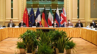 This handout photo taken and released on April 17, 2021 by the EU Delegation in Vienna shows delegation members from the parties to the Iran nuclear deal - Germany, France, Britain, China, Russia and Iran – attending a meeting at the Grand Hotel of Vienna as they try to restore the deal. Talks on Iran's nuclear programme aimed at salvaging a 2015 nuclear deal resumed on April 17, a day after Tehran said it had started producing uranium at 60 percent purity. The Islamic republic had declared it would sharply ramp up its enrichment of uranium earlier this week, after an attack on its Natanz nuclear facility that it blamed on arch-foe Israel. The European Union said Saturday's talks would involve EU officials and representatives from Britain, China, France, Germany, Russia and Iran. The talks are aimed at determining which sanctions the United States should lift and the measures Iran has to take to come into compliance with the accord.