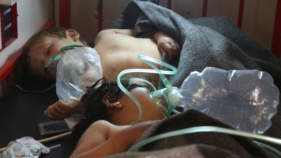 Syrian children receive treatment at a small hospital in the town of Maaret al-Noman following a suspected toxic gas attack in Khan Sheikhun, a nearby rebel-held town in Syria’s northwestern Idlib province, on April 4, 2017. Warplanes carried out a suspected toxic gas attack that killed at least 35 people including several children, a monitoring group said. The Syrian Observatory for Human Rights said those killed in the town of Khan Sheikhun, in Idlib province, had died from the effects of the gas, adding that dozens more suffered respiratory problems and other symptoms.