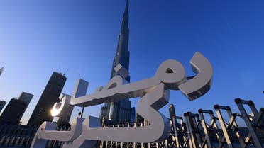 A sign which reads in Arabic Ramadan Kareem is seen pictured in front of Burj Khalifa in downtown Dubai on May 31, 2017. (File photo: AFP)