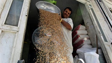 A file photo shows a man sorts wheat to be sold in Riyadh, Saudi Arabia. (Reuters/Faisal Al Nasser)