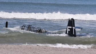WWII plane makes emergency landing in waters off Florida beach