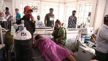 Patients use oxygen cylinders in hospital after a leakage in the oxygen plant in Nashik, in the Indian state of Maharashtra, Wednesday, on April 21, 2021 (AP)