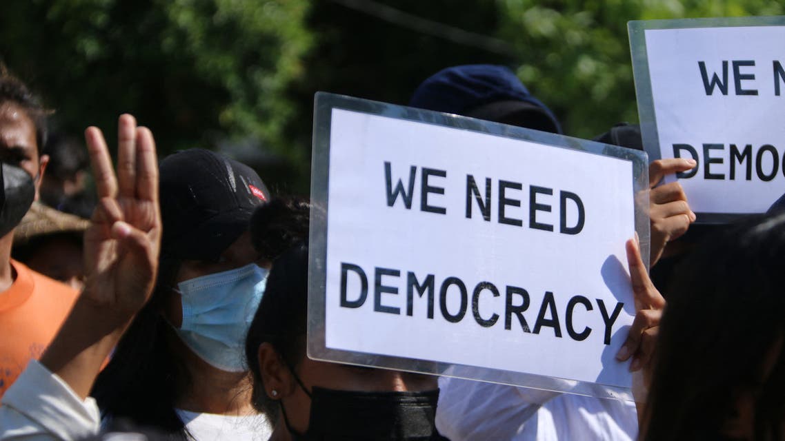 This handout photo taken and released by Dawei Watch on April 20, 2021 shows protesters holding signs as they march in a demonstration against the military coup in Dawei. (File photo: AFP)