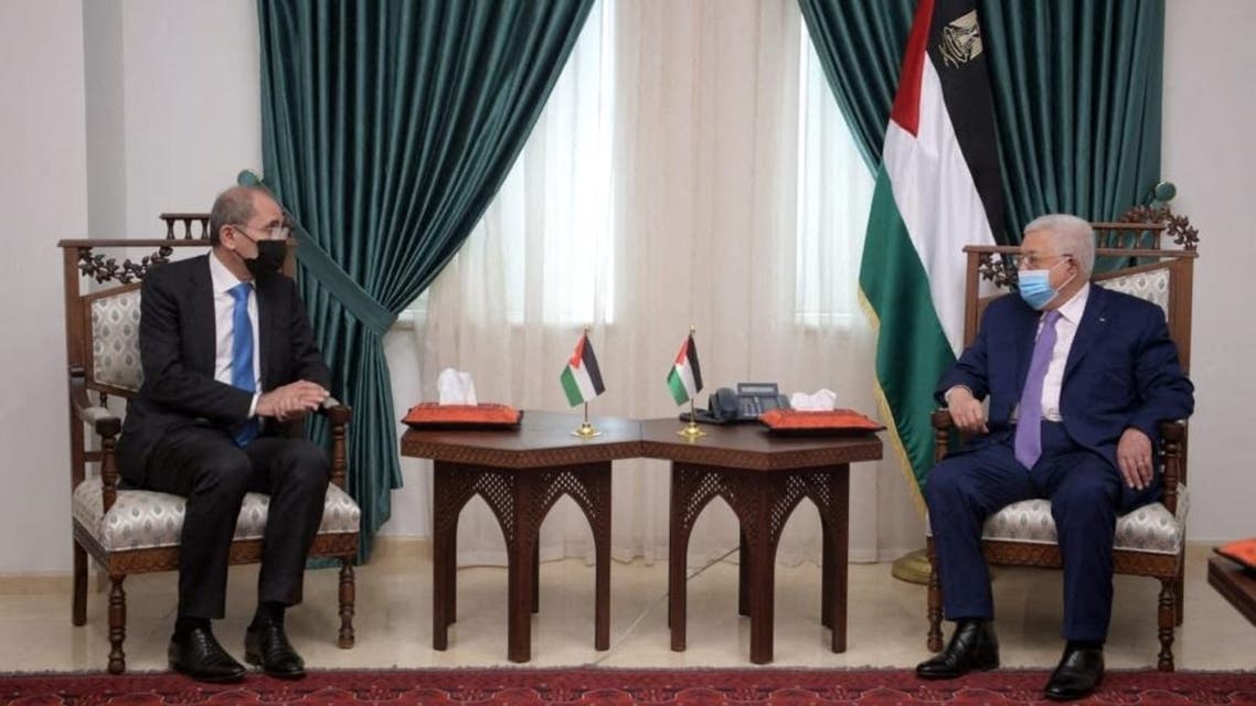Palestinian President Mahmud Abbas (R) meeting with Jordan’s Foreign Minister Ayman Safadi in Ramallah, April 21, 2021. (Jordanian Foreign Ministry/AFP)